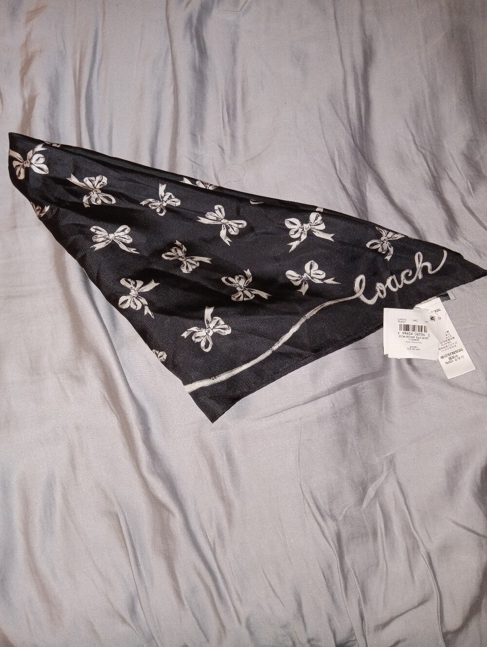 Coach Black Silk Scarf with Cream Bow Motif